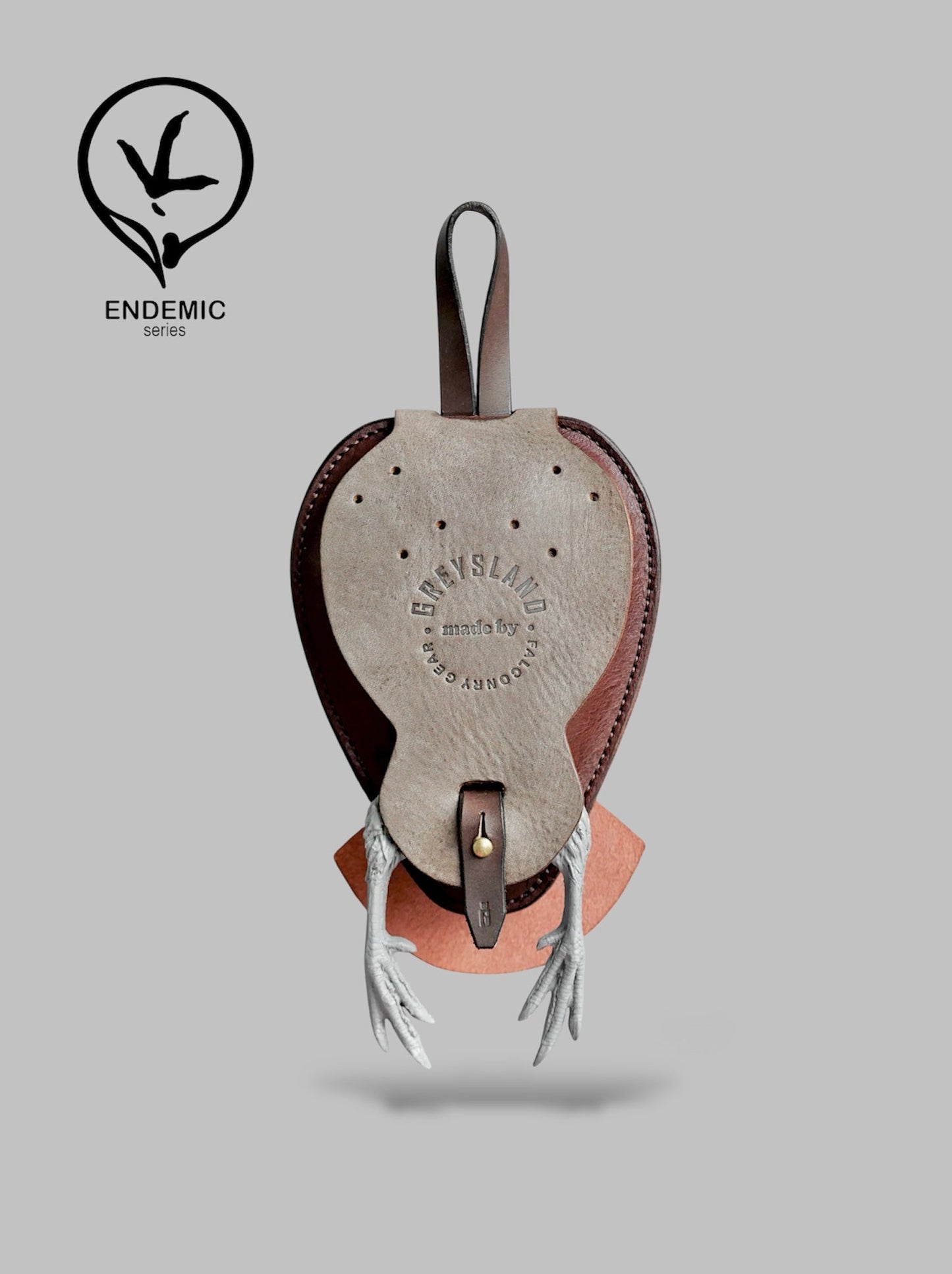 Leather product with a "GREYSLAND" brand logo on a gray background.